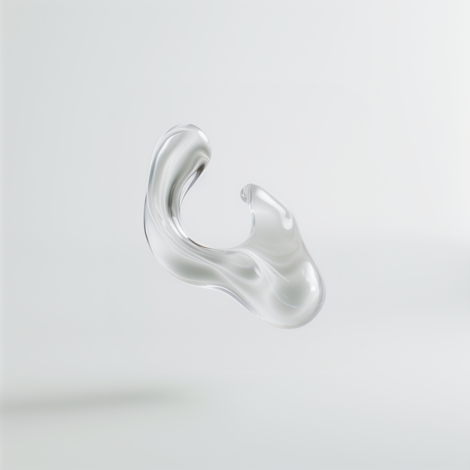 Translucent abstract sculpture with fluid curves on a pale grey ground